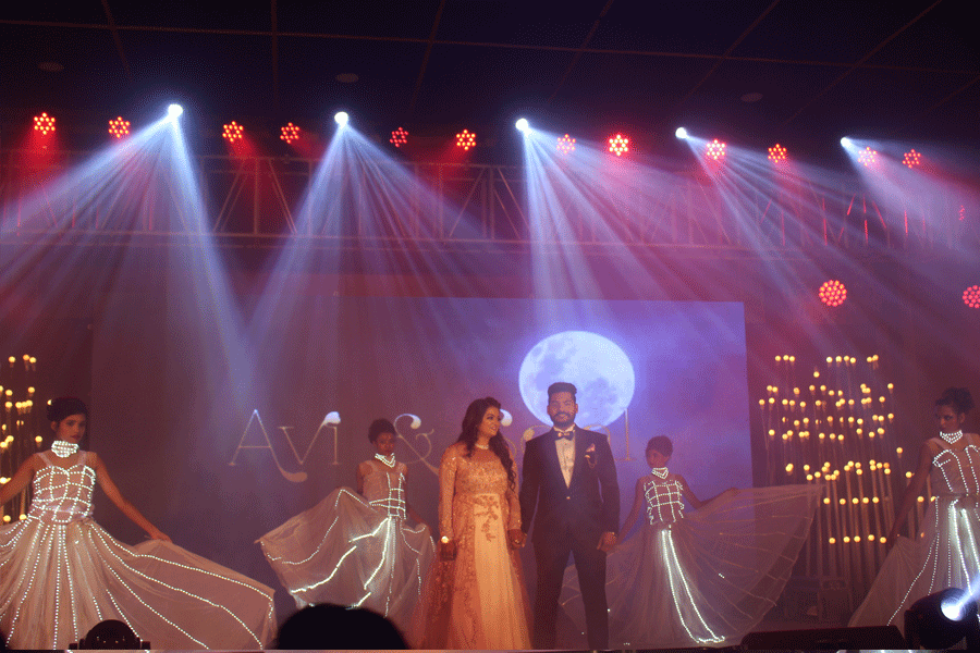 White-Led-Light-Dress-Angel-Feather-Girls-Dance-Troupe-Bride-Groom-Entry-Concept-Anchor-Wedding-Planner-Hornbill-Event-Planner-Udaipur-Rajasthan